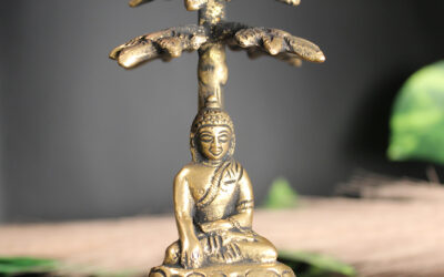 Brass Buddha under Bodhi Tree